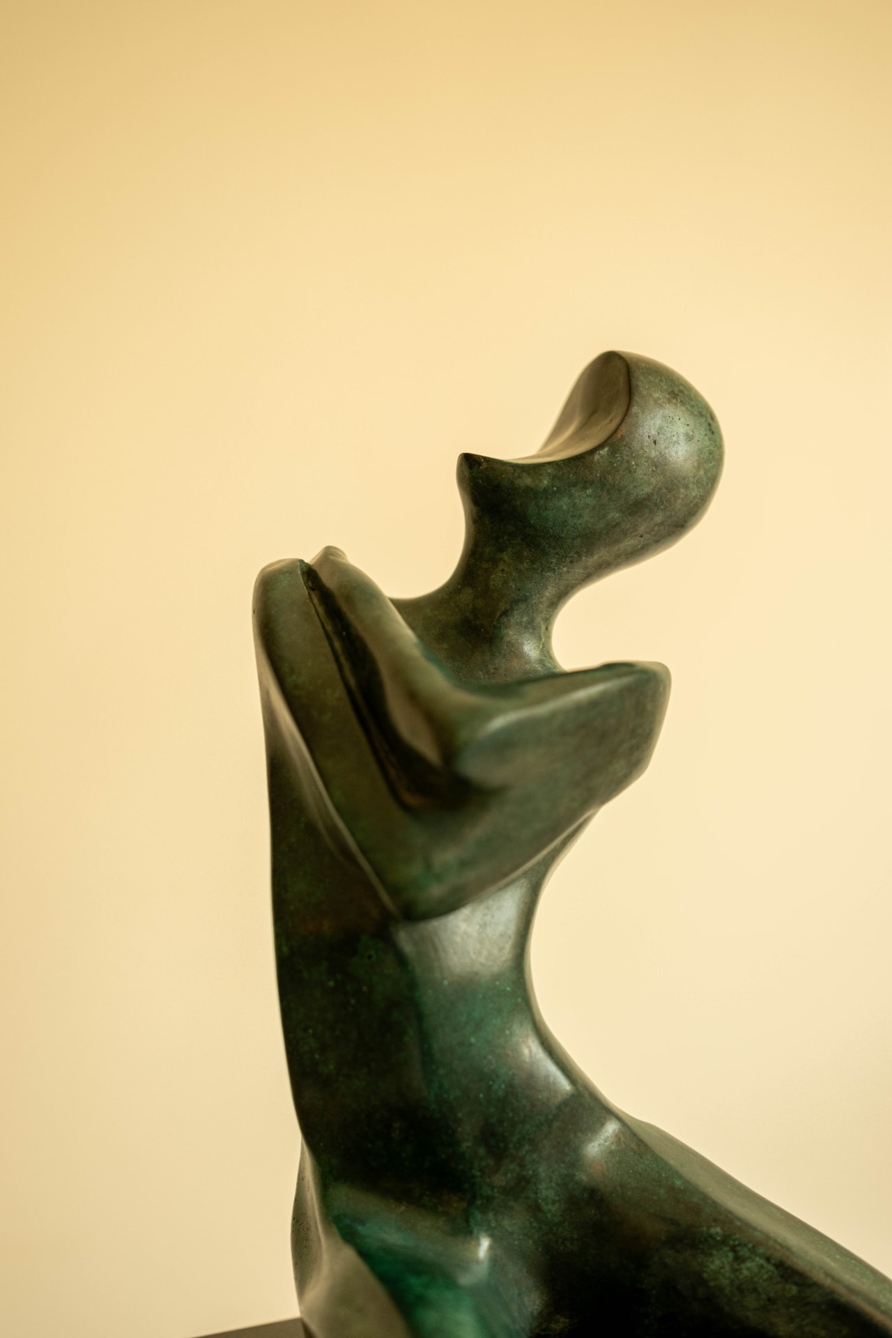 Figure on a Block — bronze sculpture with green patina