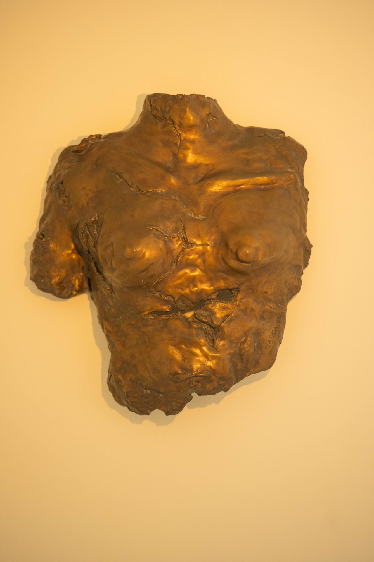 Torso Relief, wall-mounted bronze sculpture