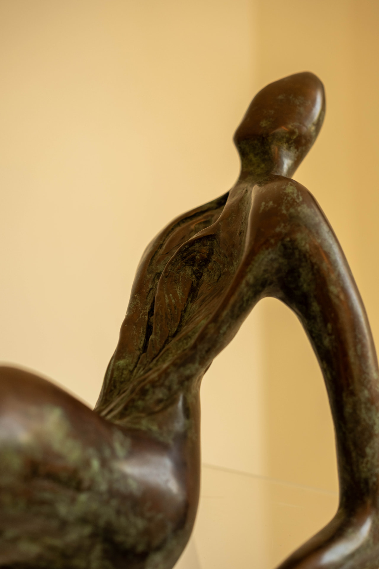 Repose, bronze sculpture