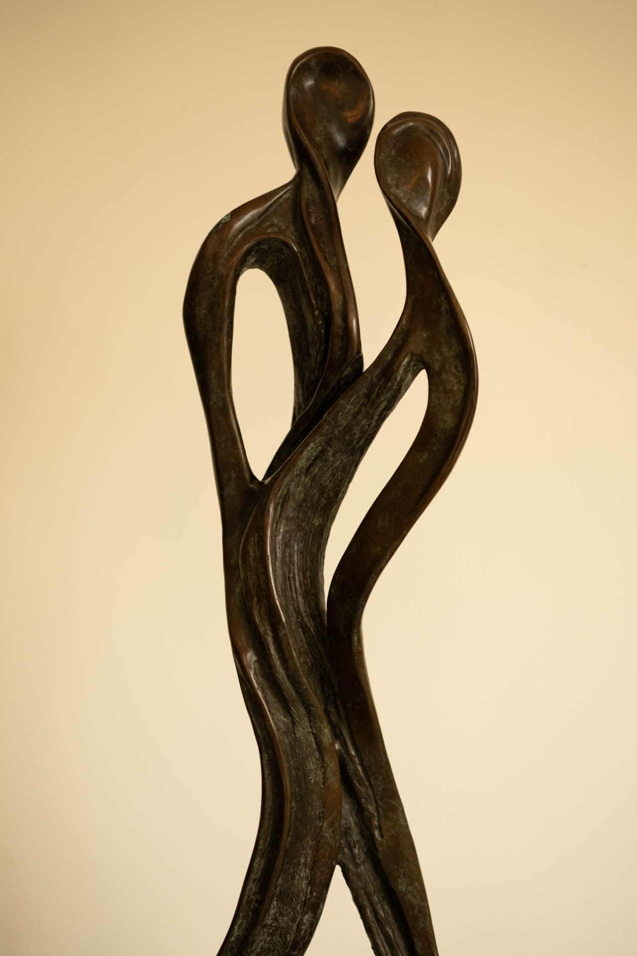 Whisper — bronze sculpture of two entwined figures