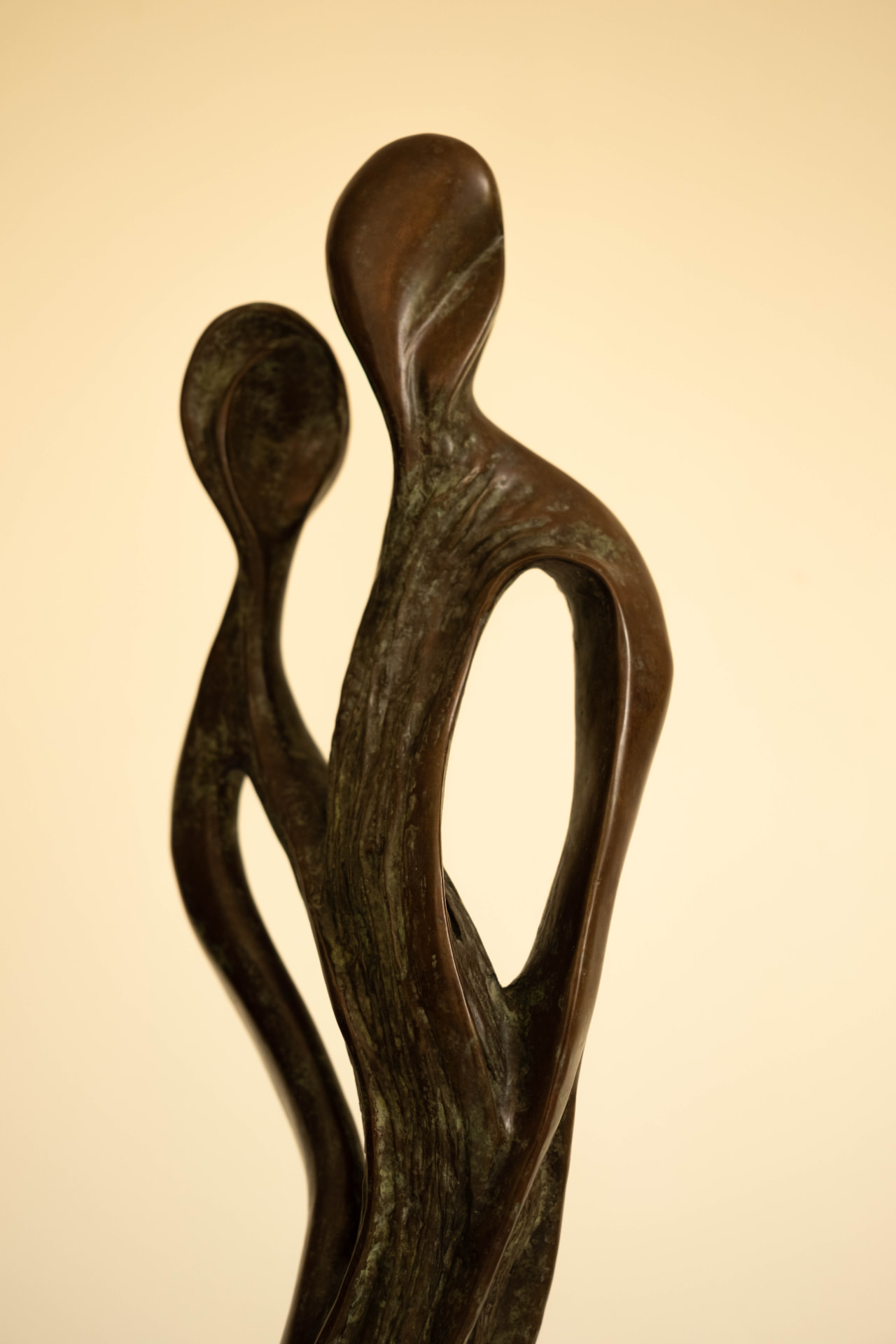 Whisper — bronze sculpture of two entwined figures