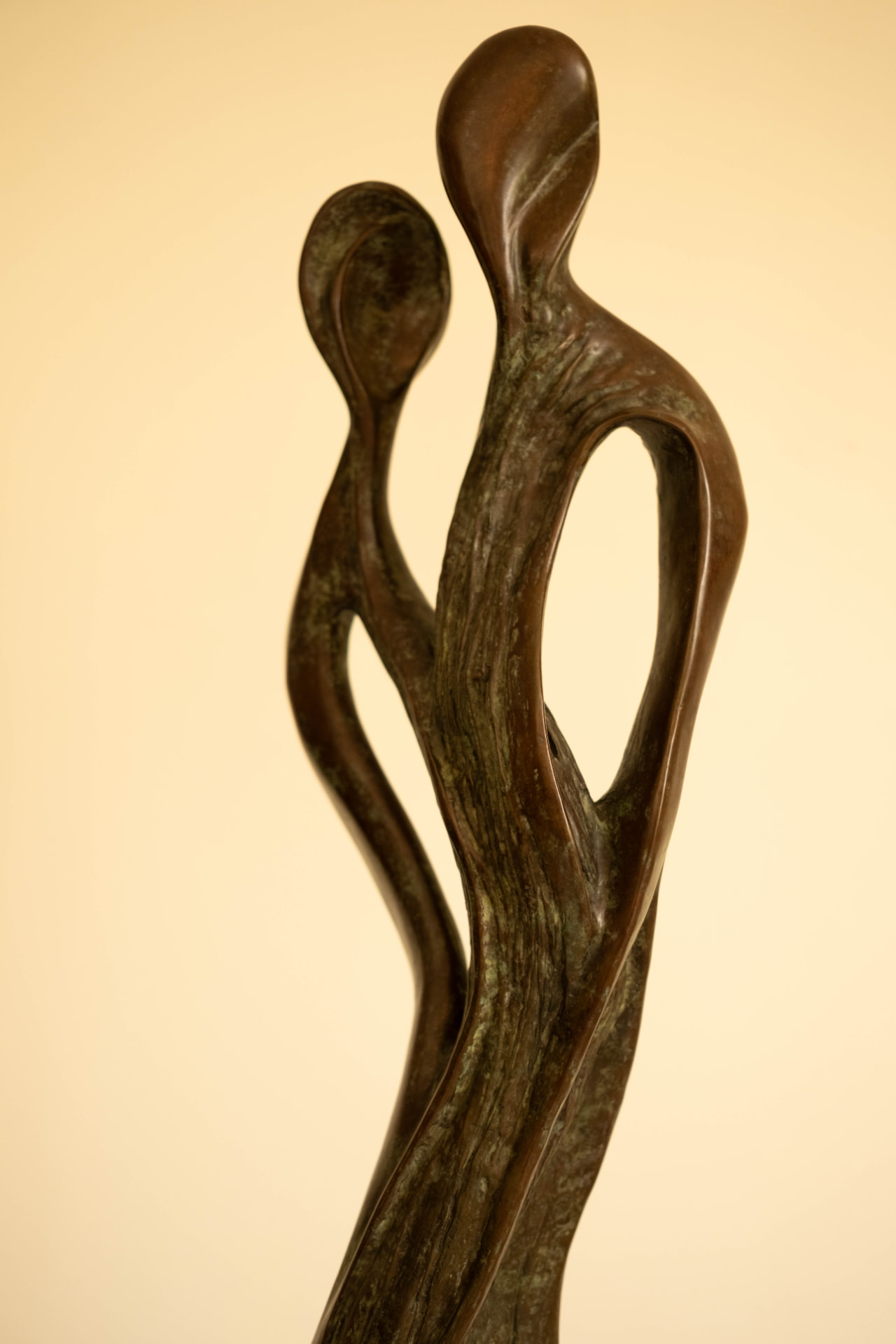 Whisper — bronze sculpture of two entwined figures