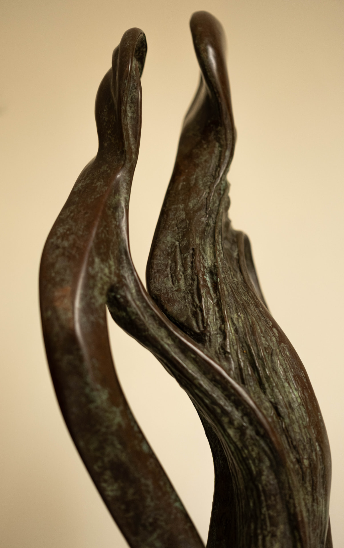 Whisper — bronze sculpture of two entwined figures