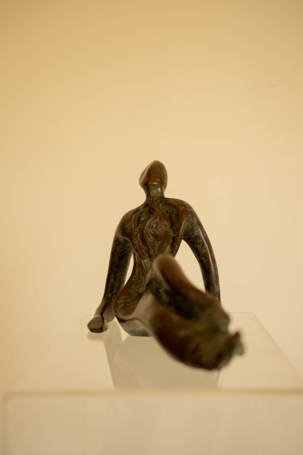 Repose, bronze sculpture