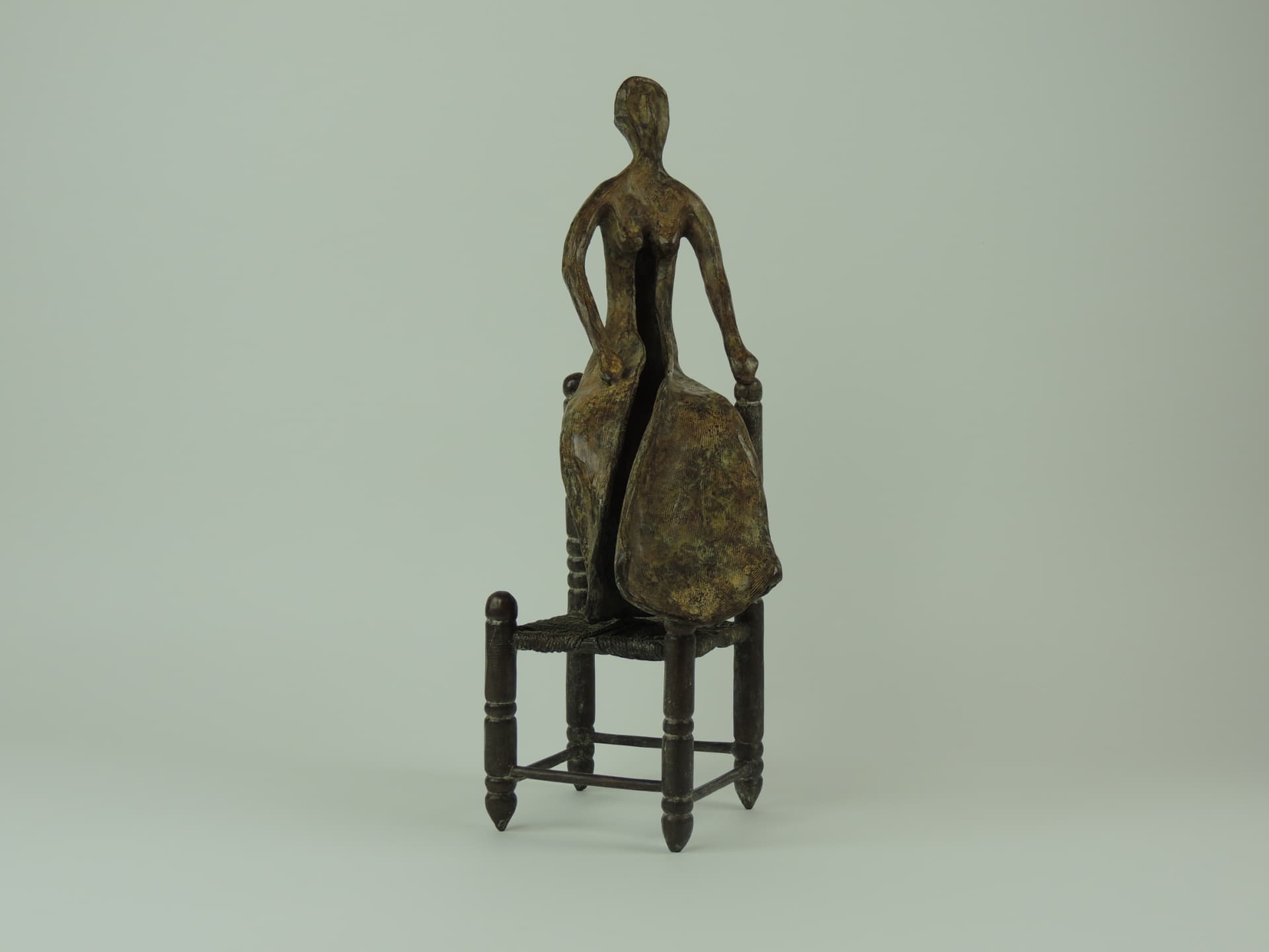 Woman on a Chair, bronze — frontal view